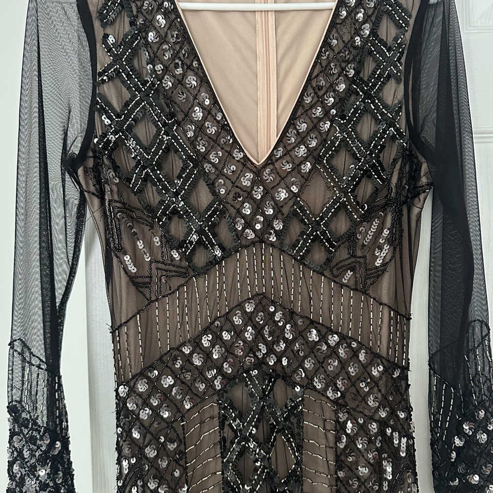 Heavily beaded black dress